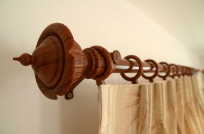 Get a Polished Look with Professional Curtain Rod Installation!